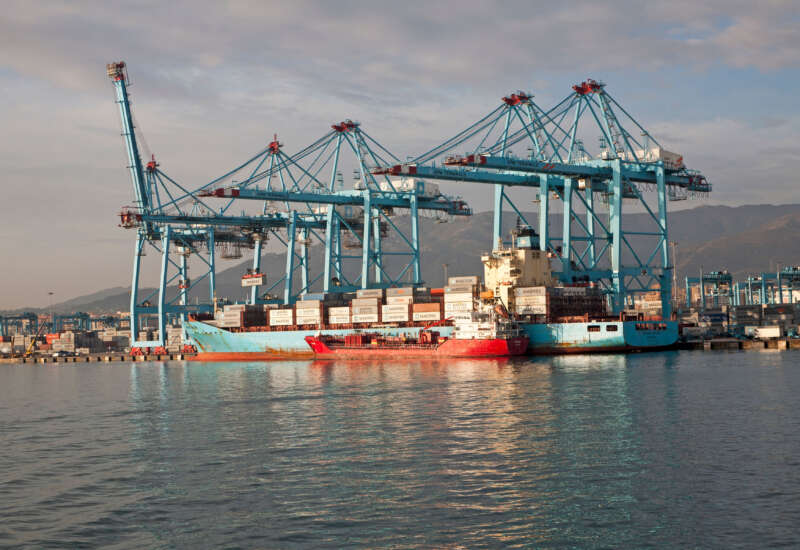 Large cranes at APM Terminals load container ships in the port at Algeciras, Cadiz Province, Spain.