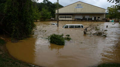 Heavy rains from Hurricane Helene caused record flooding and damage on September 28, 2024, in Asheville, North Carolina.