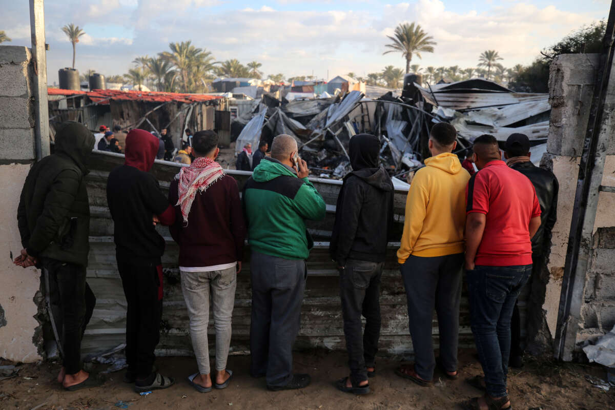 Palestinians inspect the damage in the aftermath of an Israeli strike on a tent camp in Khan Younis, Gaza Strip, on December 5, 2024, amid the ongoing war between Israel and Hamas militants.