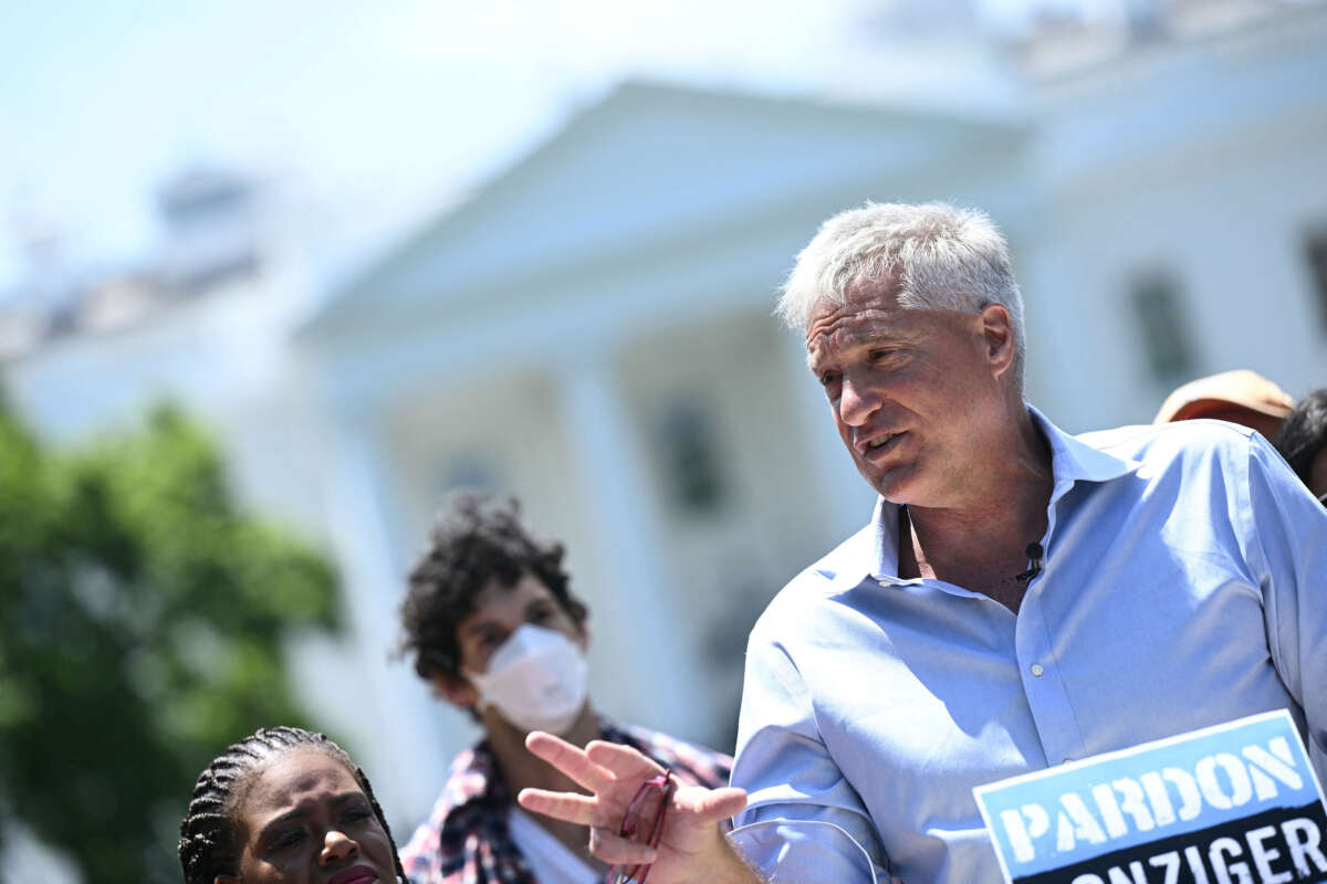 Environmental human rights lawyer Steven Donziger and climate activists rally to demand a pardon for Donziger, who was involved in legal action against oil giant Chevron, at Lafayette Square in front of the White House in Washington, D.C, on June 12, 2024.