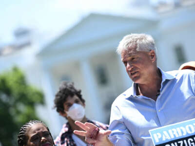 Environmental human rights lawyer Steven Donziger and climate activists rally to demand a pardon for Donziger, who was involved in legal action against oil giant Chevron, at Lafayette Square in front of the White House in Washington, D.C, on June 12, 2024.