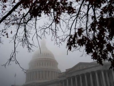 Fog hovers over the dome of the U.S. Capitol on December 10, 2024, in Washington, D.C.