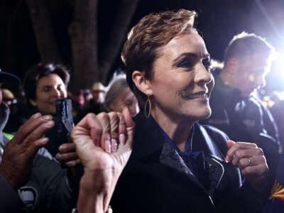 Arizona Republican Senate candidate Kari Lake greets supporters at her Election Eve Rally outside the Yavapai County Courthouse on November 4, 2024, in Prescott, Arizona.