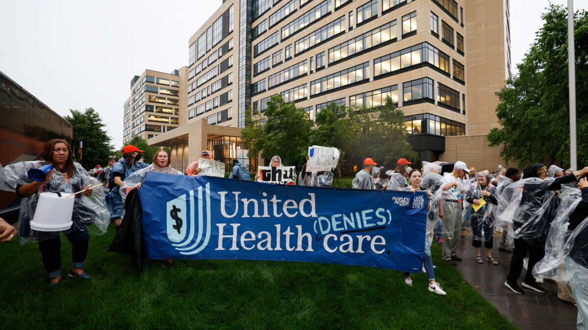 Health care advocates risk arrest protesting care denials at UnitedHealthcare on July 15, 2024, in Minnetonka, Minnesota.