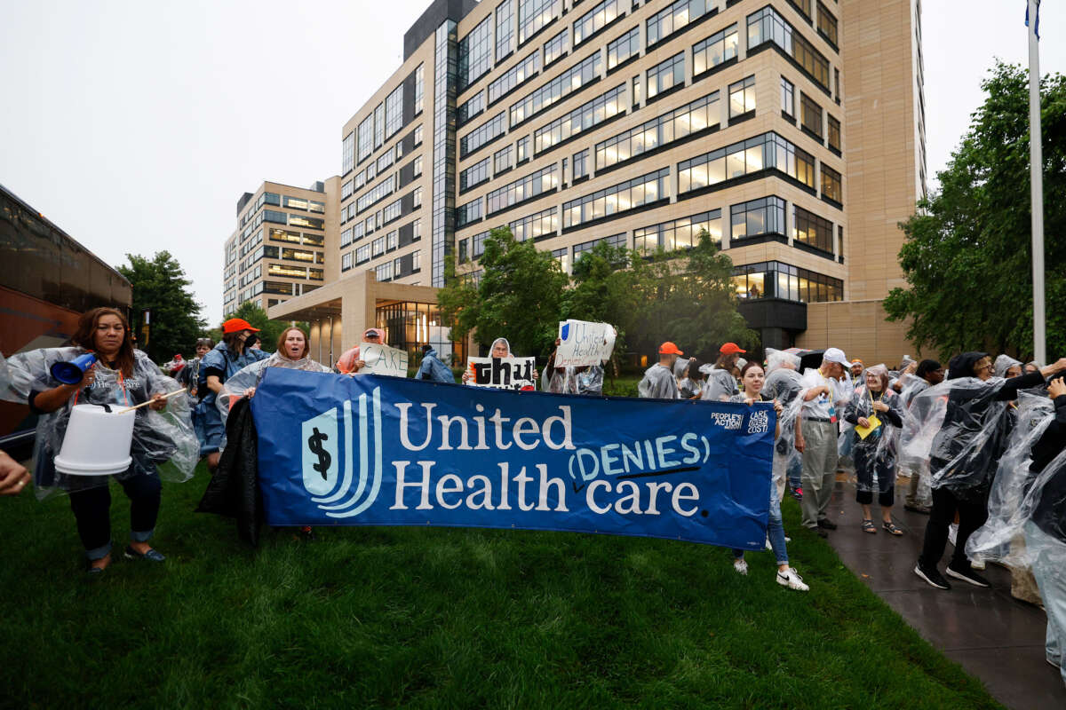 Health care advocates risk arrest protesting care denials at UnitedHealthcare on July 15, 2024, in Minnetonka, Minnesota.