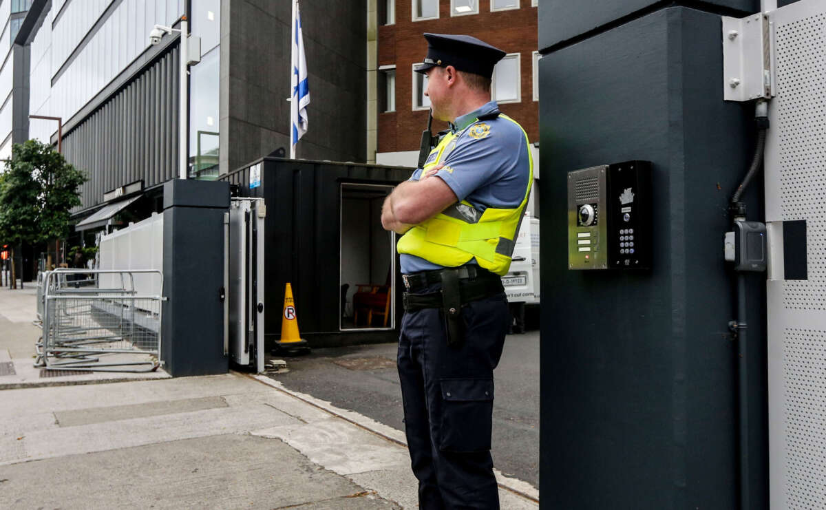 A guard is seen on duty at the entrance to the Israeli embassy in Dublin on May 22, 2024.