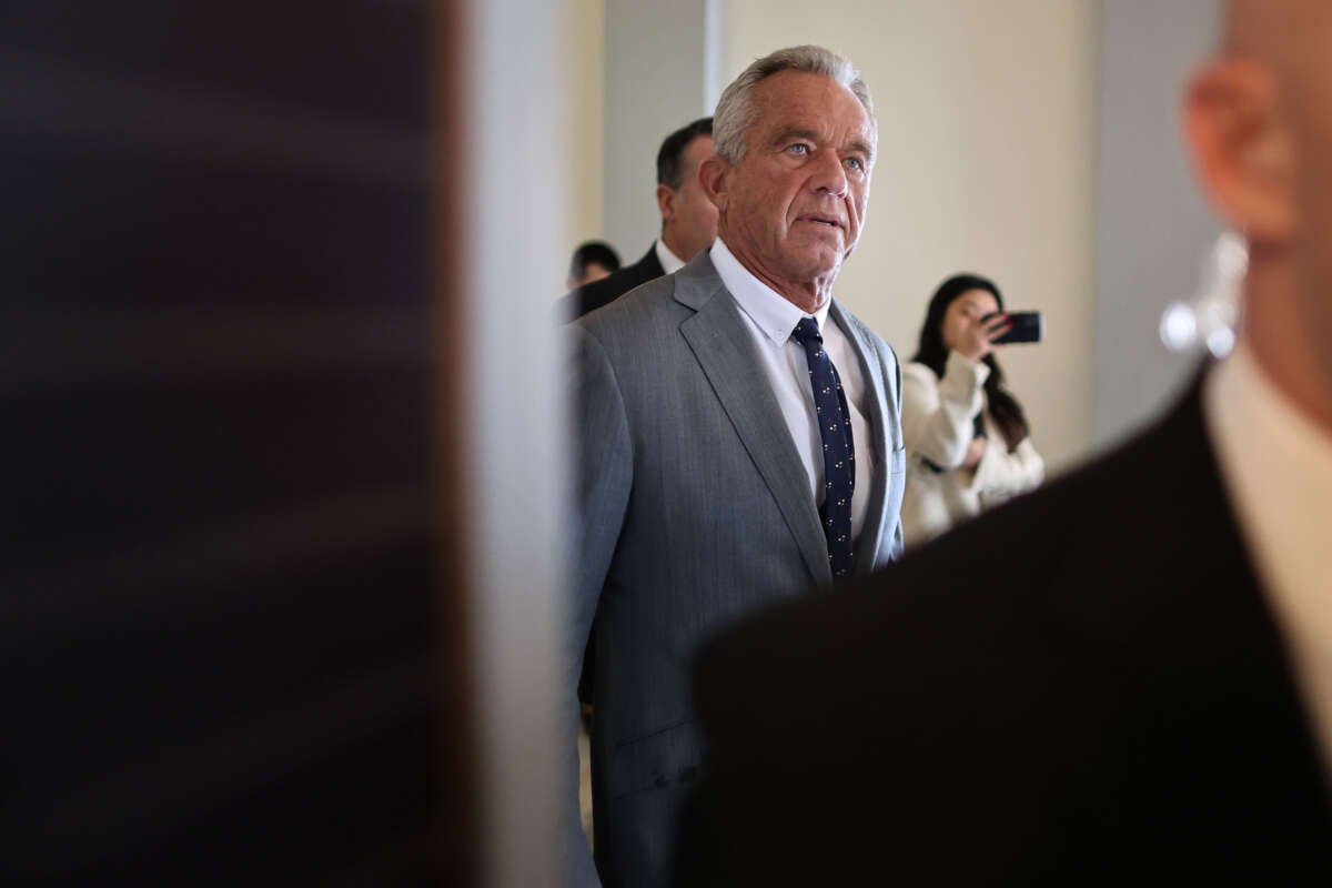 Robert F. Kennedy Jr., President-elect Donald Trump's nominee to be Secretary of Health and Human Services, moves between meetings with senators in the Russell Senate Office Building on Capitol Hill on December 17, 2024, in Washington, D.C.