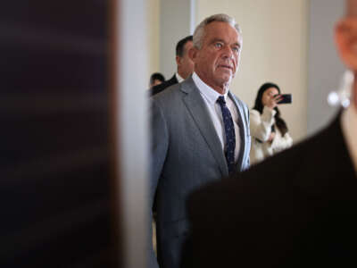 Robert F. Kennedy Jr., President-elect Donald Trump's nominee to be Secretary of Health and Human Services, moves between meetings with senators in the Russell Senate Office Building on Capitol Hill on December 17, 2024, in Washington, D.C.