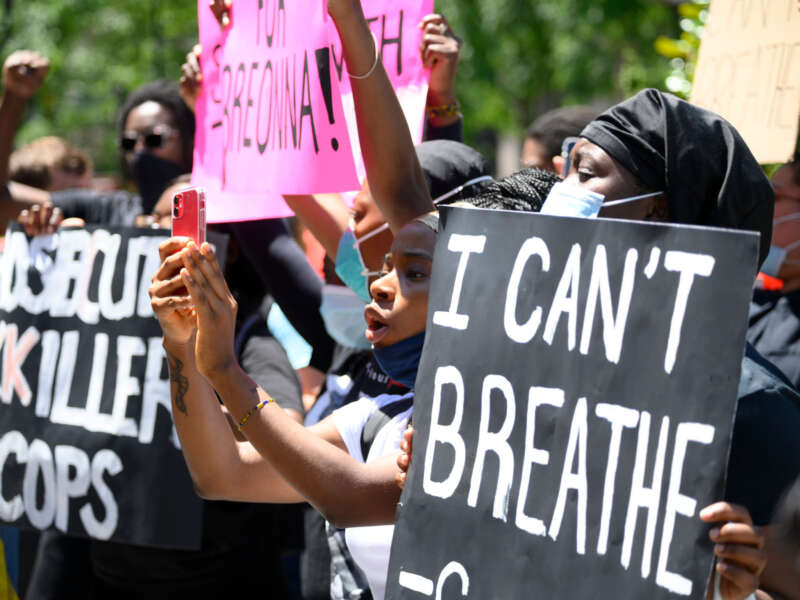 Philadelphians participate in a vigil for George Floyd as thousands around the nation protest police brutality during similar events, outside City Hall in Philadelphia, Pennsylvania, on May 30, 2020.