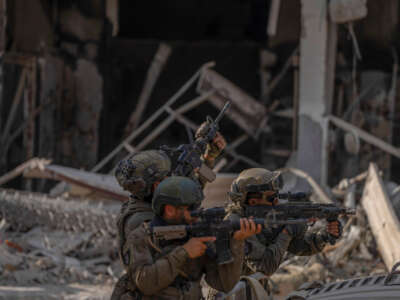 A photograph, taken during an embed with the Israeli Defense Forces (IDF) and reviewed by the IDF censorship office prior to publication, shows Israeli soldiers guarding the entrance of a tunnel.