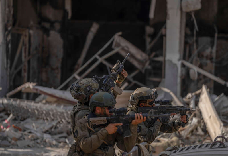 A photograph, taken during an embed with the Israeli Defense Forces (IDF) and reviewed by the IDF censorship office prior to publication, shows Israeli soldiers guarding the entrance of a tunnel.