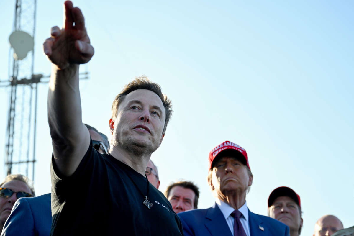 Elon Musk speaks with President-elect Donald Trump and guests at a viewing of the launch of the sixth test flight of the SpaceX Starship rocket on November 19, 2024, in Brownsville, Texas.