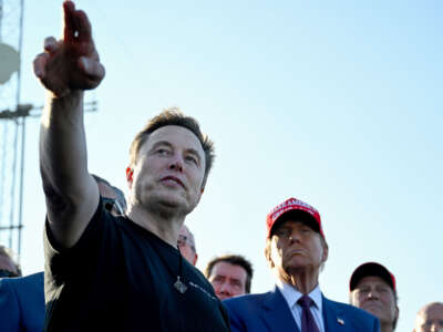 Elon Musk speaks with President-elect Donald Trump and guests at a viewing of the launch of the sixth test flight of the SpaceX Starship rocket on November 19, 2024, in Brownsville, Texas.