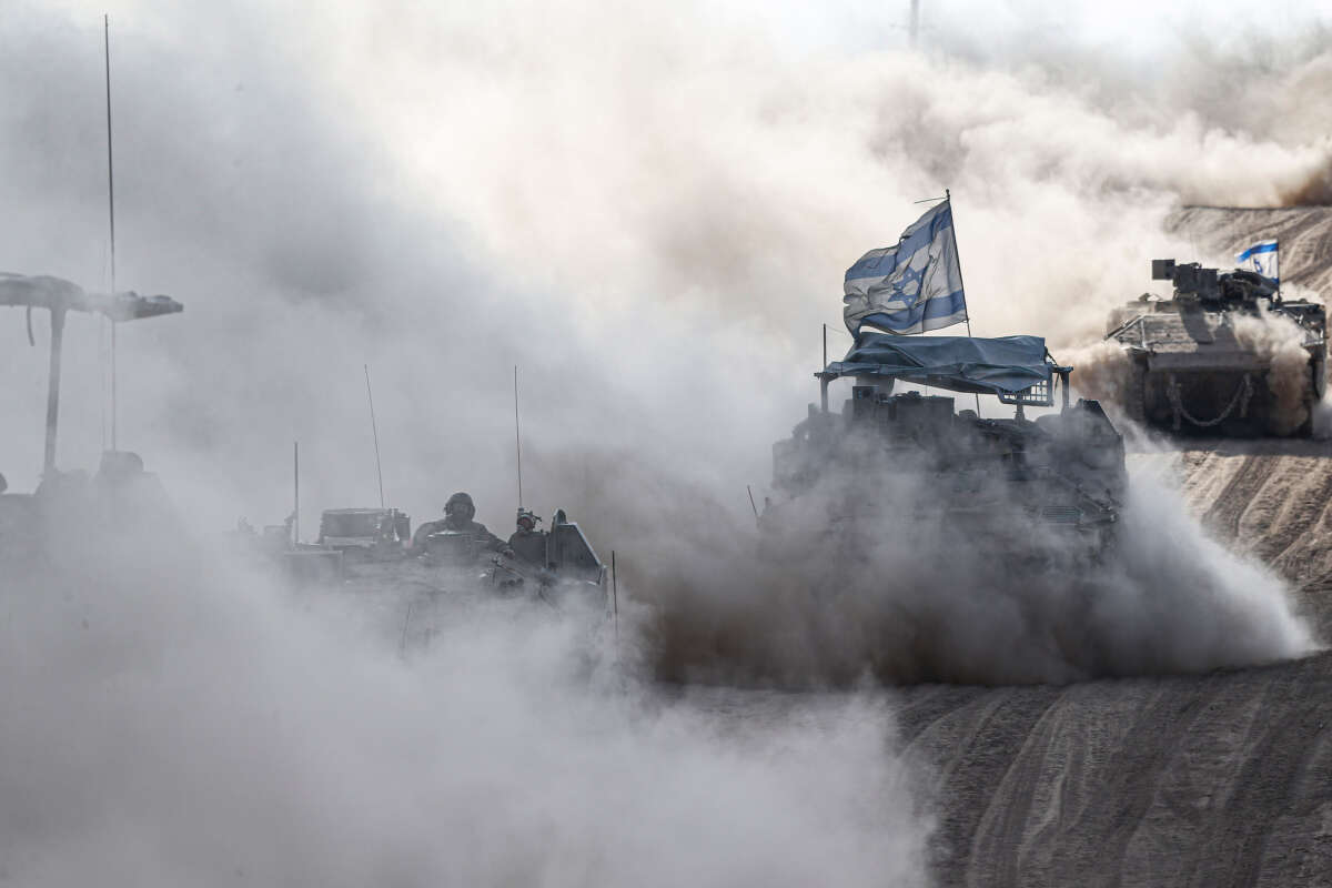 Israeli tanks move along the border near Rafah, Gaza, on May 29, 2024.