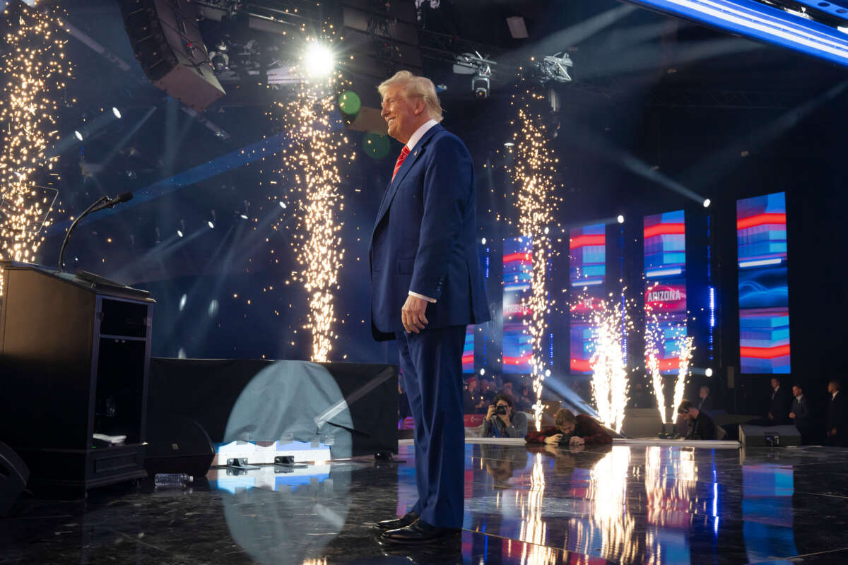 President-elect Donald Trump exists the stage during Turning Point USA's AmericaFest at the Phoenix Convention Center on December 22, 2024, in Phoenix, Arizona.