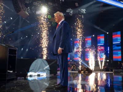 President-elect Donald Trump exists the stage during Turning Point USA's AmericaFest at the Phoenix Convention Center on December 22, 2024, in Phoenix, Arizona.