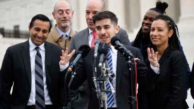 Lawyer and transgender rights activist Chase Strangio speaks after arguing in a transgender rights case before the U.S. Supreme Court on December 4, 2024, in Washington, D.C.