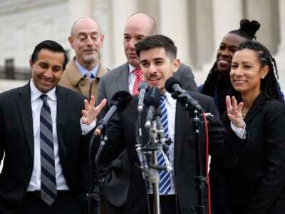 Lawyer and transgender rights activist Chase Strangio speaks after arguing in a transgender rights case before the U.S. Supreme Court on December 4, 2024, in Washington, D.C.