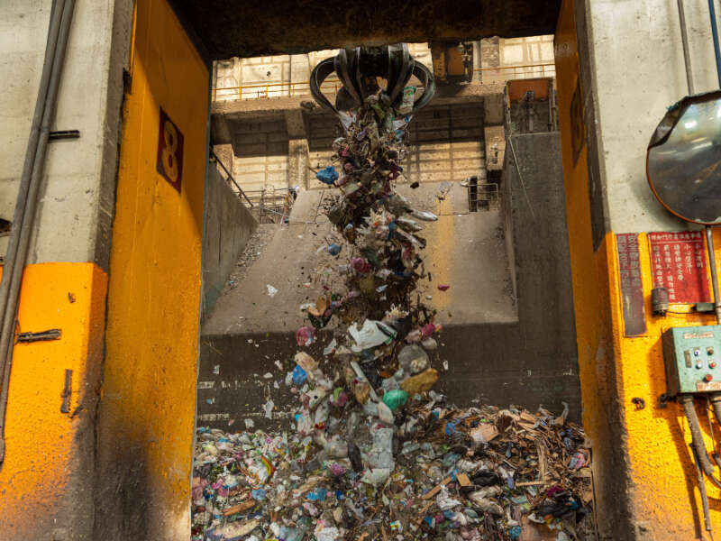 A refuse crane operates in a waste bunker at Tainan Yongkang garbage incineration plant on December 9, 2024, in Tainan, Taiwan.