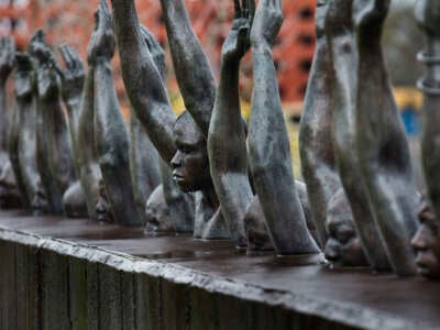 Hank Willis Thomas' 'Raise Up' statue, which depicts issues of police violence and incarceration, in the National Memorial for Peace and Justice on March 3, 2020, in Montgomery, Alabama.