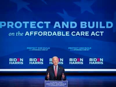 Then-Democratic presidential nominee Joe Biden delivers remarks about the Affordable Care Act and COVID-19 after attending a virtual coronavirus briefing with medical experts at The Queen theater in Wilmington, Delaware, on October 28, 2020.