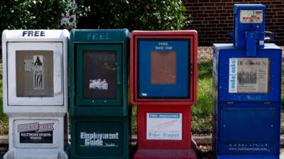 A Baltimore Sun newspaper bin stands with others in Baltimore, Maryland, on March 11, 2021.