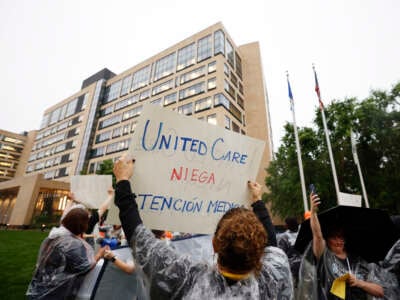 Health care advocates risk arrest protesting care denials at UnitedHealthcare headquarters on July 15, 2024, in Minnetonka, Minnesota.