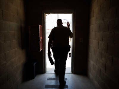 Lt. Johnathon Cuske leaves a corridor on death row and walks outside to what once was the caged area for death row inmates at the Central California Women's Facility on June 18, 2024, in Chowchilla, California.