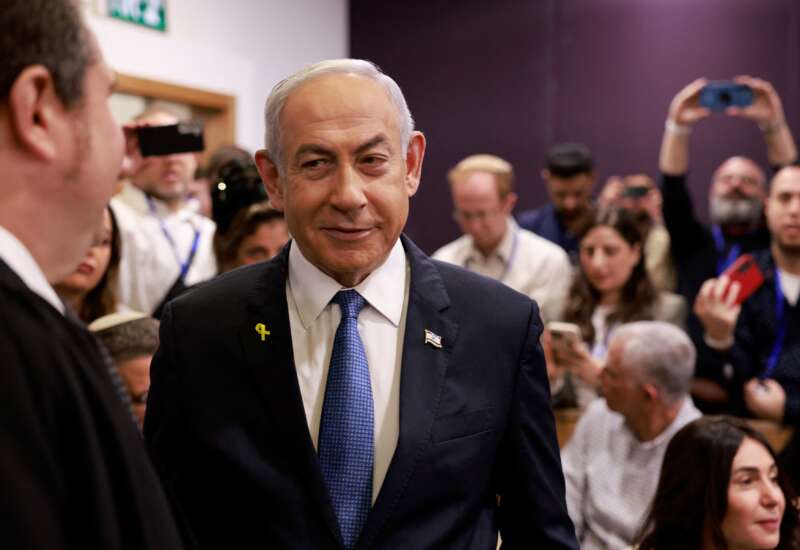 Israeli Prime Minister Benjamin Netanyahu arrives at the district court in Tel Aviv for his hearing on corruption charges on December 10, 2024.