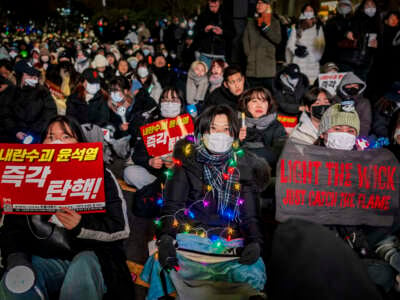 Protesters take part in a protest against the president outside the National Assembly on December 8, 2024, in Seoul, South Korea.