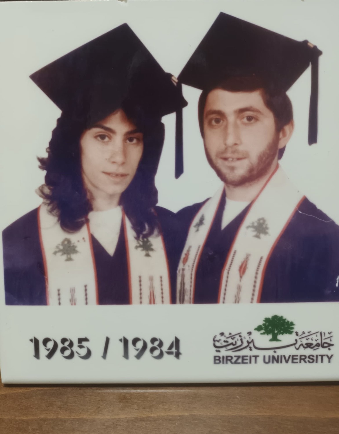 Khalida Jarrar and her husband Ghassan Jarrar are shown in their cap and gowns as graduates of Birzeit University, class of 1985 / 1984 respectively.