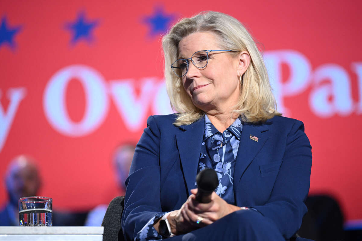 Former Rep. Liz Cheney looks on during a moderated conversation with Vice President and Democratic presidential candidate Kamala Harris at the Royal Oak Music Theatre in Royal Oak, Michigan, on October 21, 2024.