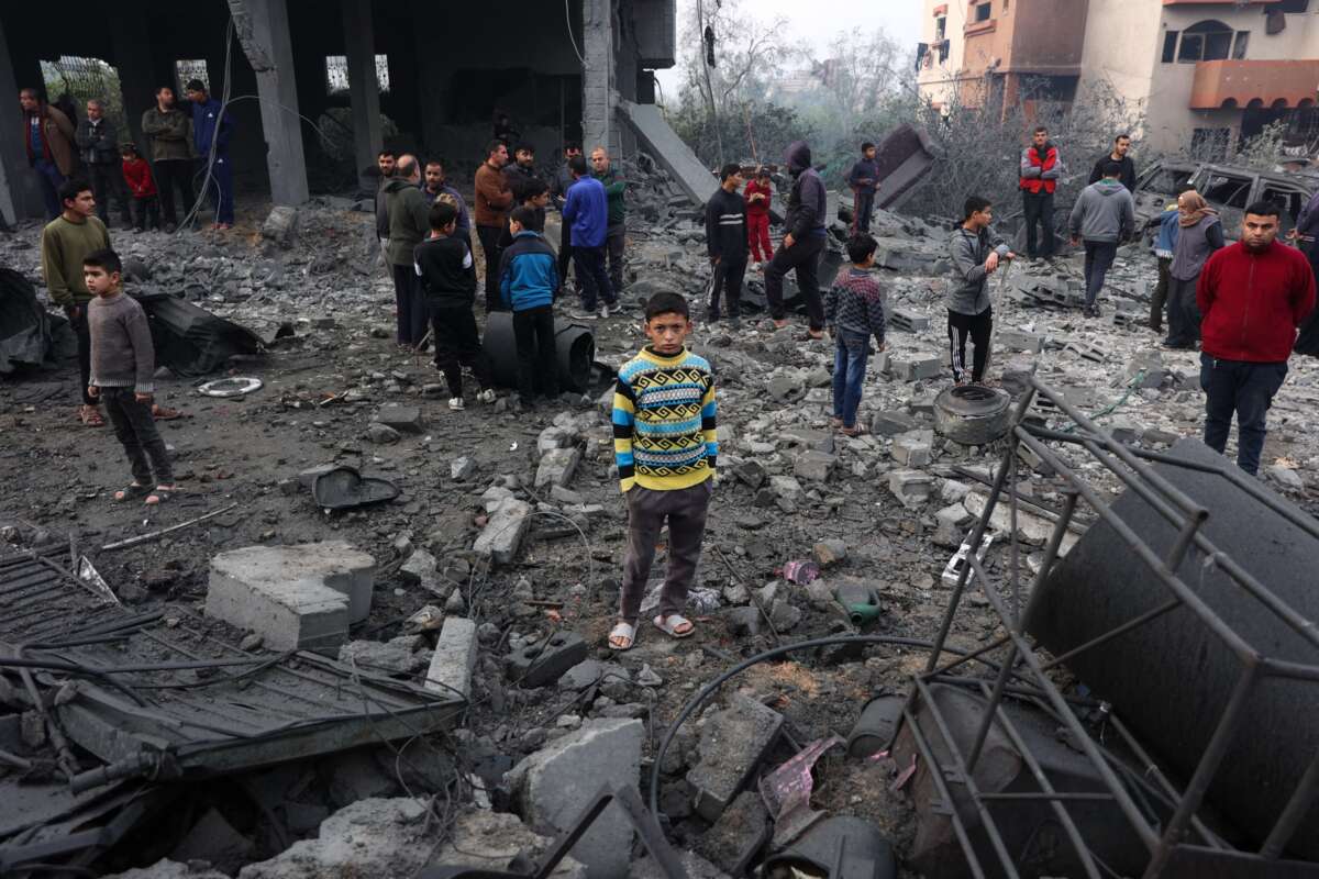 People check the rubble of buildings hit in Israeli strikes the previous night in Jabalia in the northern Gaza Strip, on January 16, 2025, following a truce announcement amid the war between Israel and the Palestinian Hamas movement.