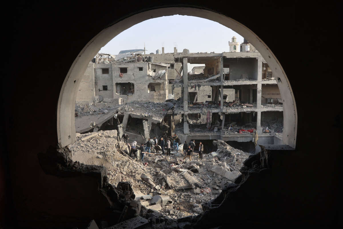 Palestinians inspect the damage in Gaza City's al-Zaitoun neighborhood on December 26, 2024.