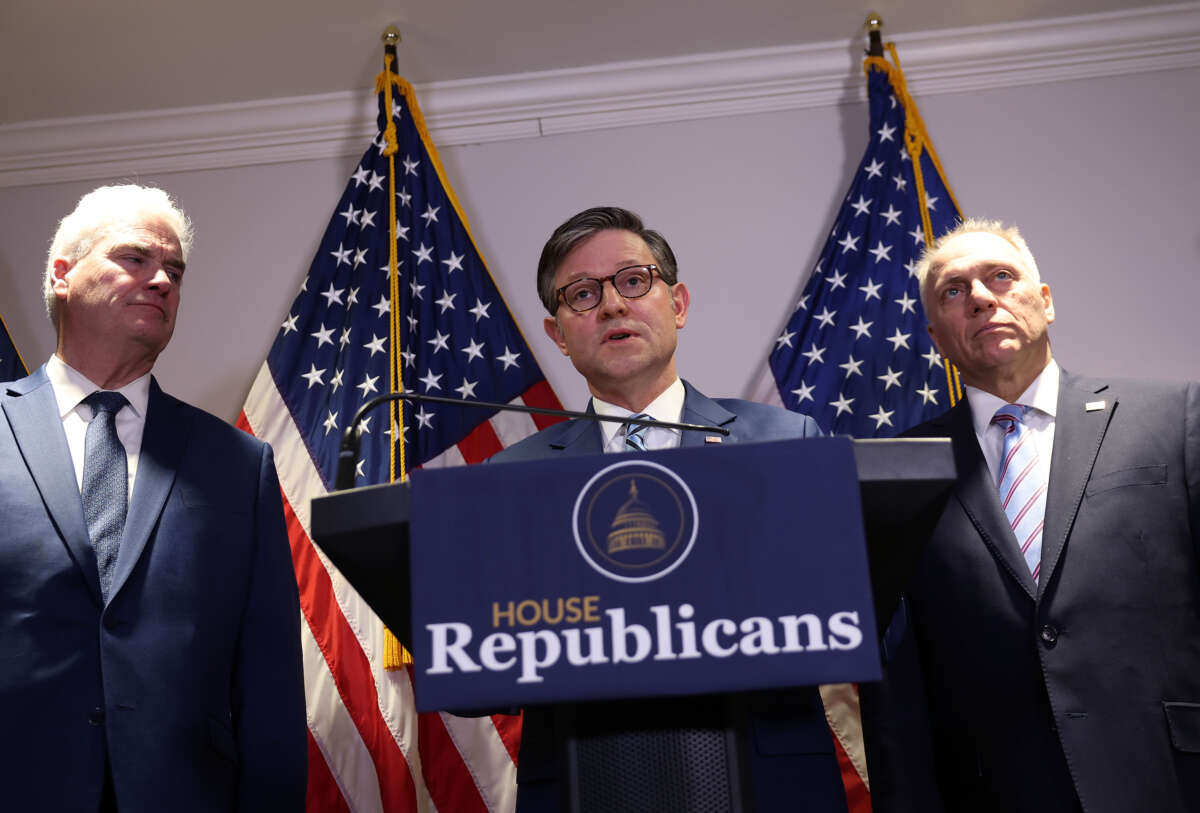 Speaker of the House Mike Johnson, joined by House Majority Whip Tom Emmer (left) and House Majority Leader Steve Scalise, speaks at a press conference on Capitol Hill on December 4, 2024, in Washington, D.C.