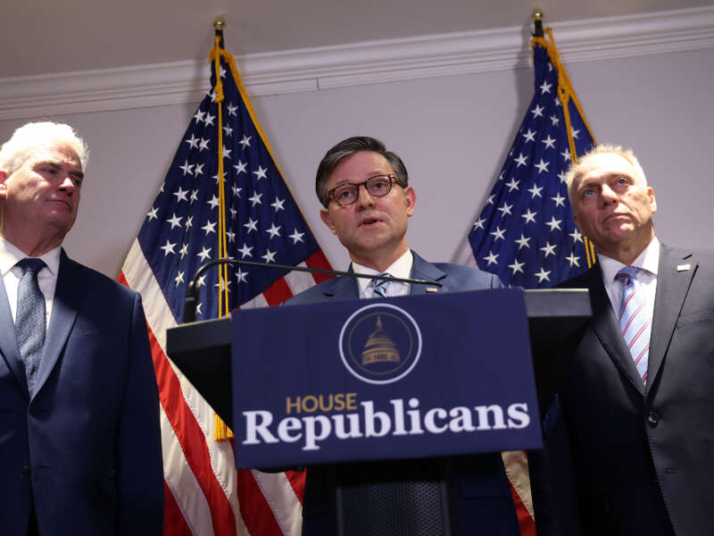 Speaker of the House Mike Johnson, joined by House Majority Whip Tom Emmer (left) and House Majority Leader Steve Scalise, speaks at a press conference on Capitol Hill on December 4, 2024, in Washington, D.C.