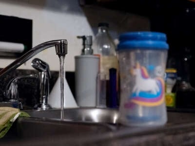 A running kitchen faucet