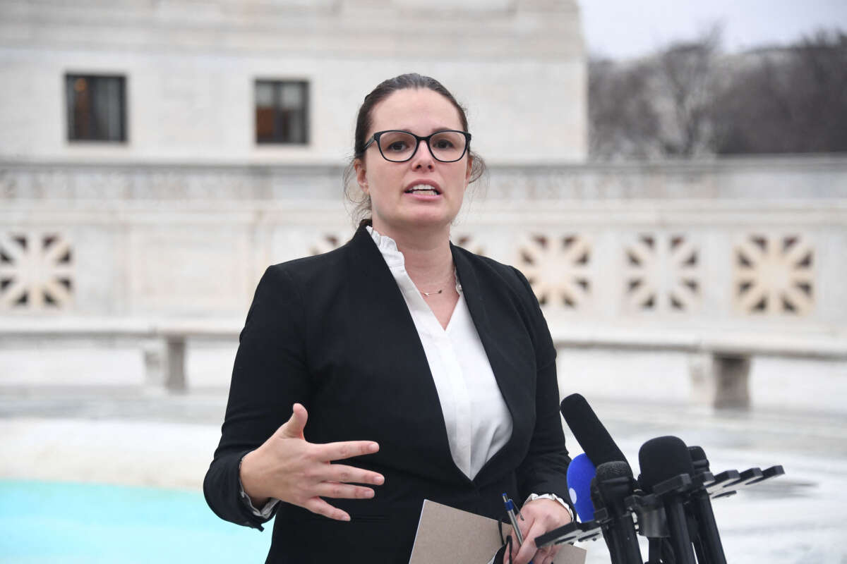 Allison Riggs speaks to the press in front of the U.S. Supreme Court in Washington, D.C., on December 7, 2022.