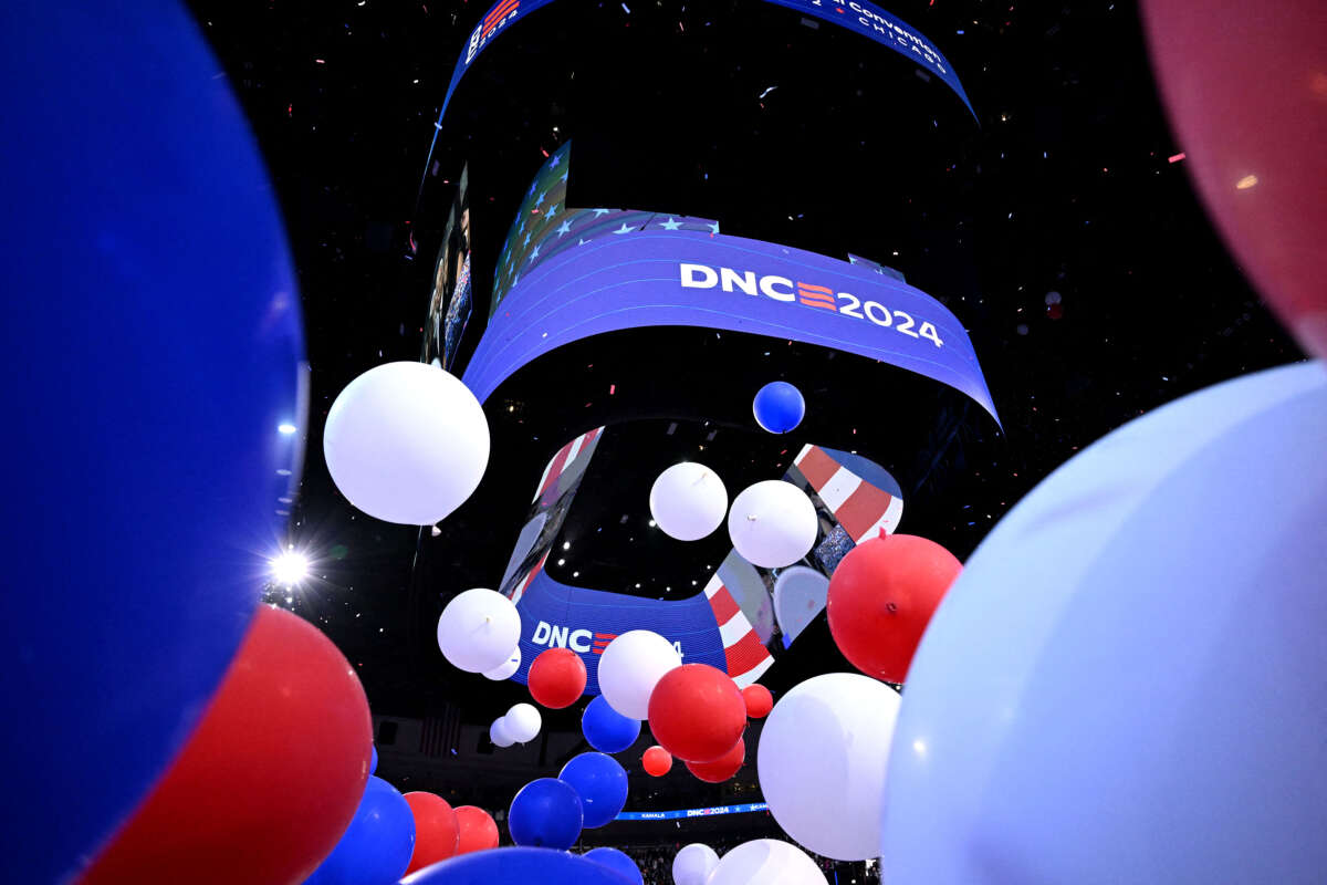 Balloons fall at the end of the fourth and last day of the Democratic National Convention (DNC) at the United Center in Chicago, Illinois, on August 22, 2024.