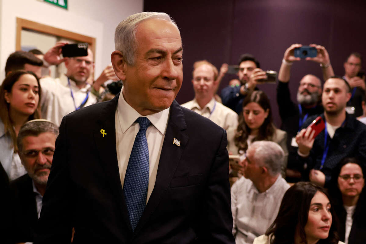 Israeli Prime Minister Benjamin Netanyahu arrives at the district court in Tel Aviv for his hearing on corruption charges on December 10, 2024.