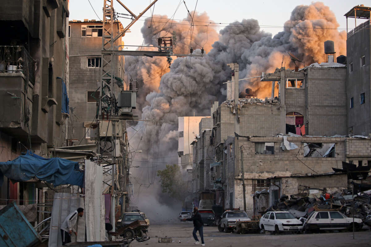 Smoke rises from a building destroyed by an Israeli airstrike at the Bureij camp for Palestinian refugees in the central Gaza Strip on January 12, 2025.