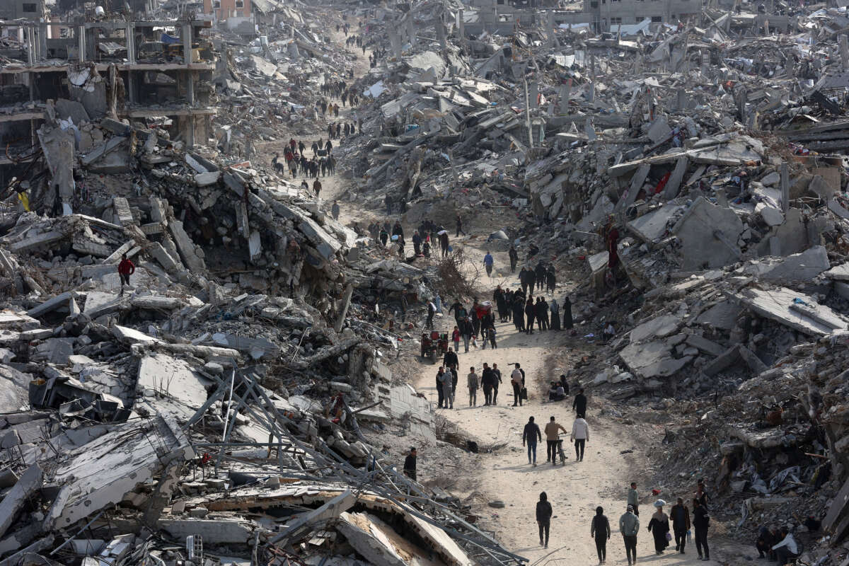 This aerial view shows displaced Palestinians returning to the war-devastated Jabalia refugee camp in the northern Gaza Strip on January 19, 2025, shortly before a ceasefire deal in the war between Israel and the Palestinian militant group Hamas was implemented.