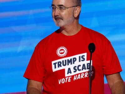 United Auto Workers President Shawn Fain speaks onstage during the first day of the Democratic National Convention at the United Center on August 19, 2024, in Chicago, Illinois.