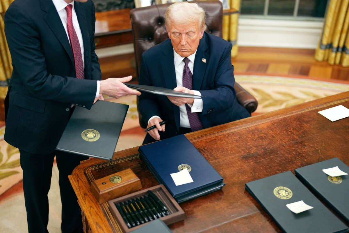 President Donald Trump signs a series of executive orders at the White House on January 20, 2025, in Washington, D.C.