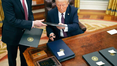 President Donald Trump signs a series of executive orders at the White House on January 20, 2025, in Washington, D.C.