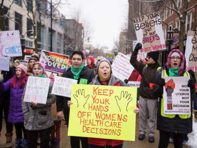 Abortion rights supporters march in Madison, Wisconsin, on January 22, 2022.