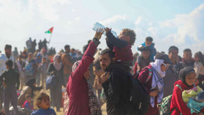 Displaced Palestinians use the Netzarim Corridor to reach their homes in North Gaza during the ceasefire on January 27, 2025.