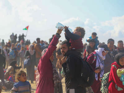 Displaced Palestinians use the Netzarim Corridor to reach their homes in North Gaza during the ceasefire on January 27, 2025.