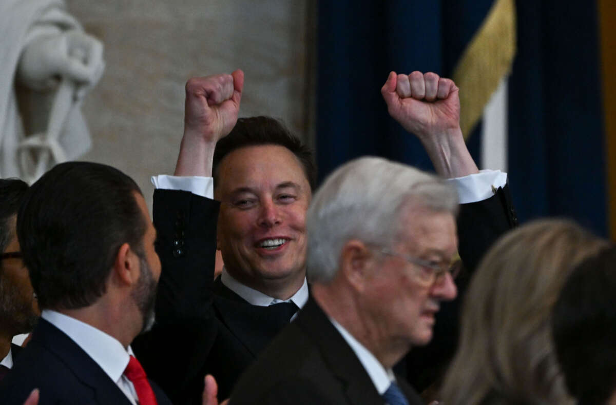 Tesla CEO Elon Musk reacts as newly sworn-in President Donald Trump speaks during the 60th inaugural ceremony on January 20, 2025, in the U.S. Capitol Rotunda in Washington, D.C.