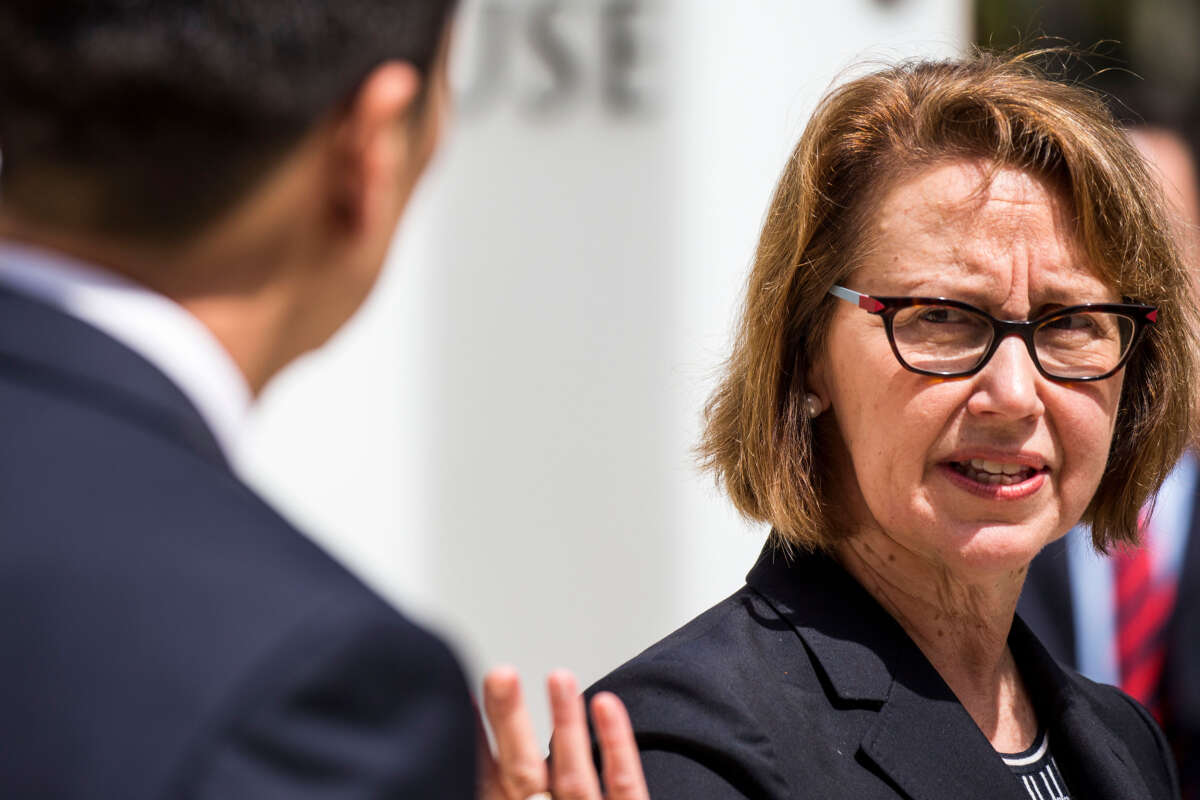 Hawaii State Attorney General Douglas Chin (left) and Oregon Attorney General Ellen Rosenblum speak at a press conference in front of the Prince Jonah Kuhio Federal Building and U.S. District Courthouse on March 15, 2017, in Honolulu, Hawaii.